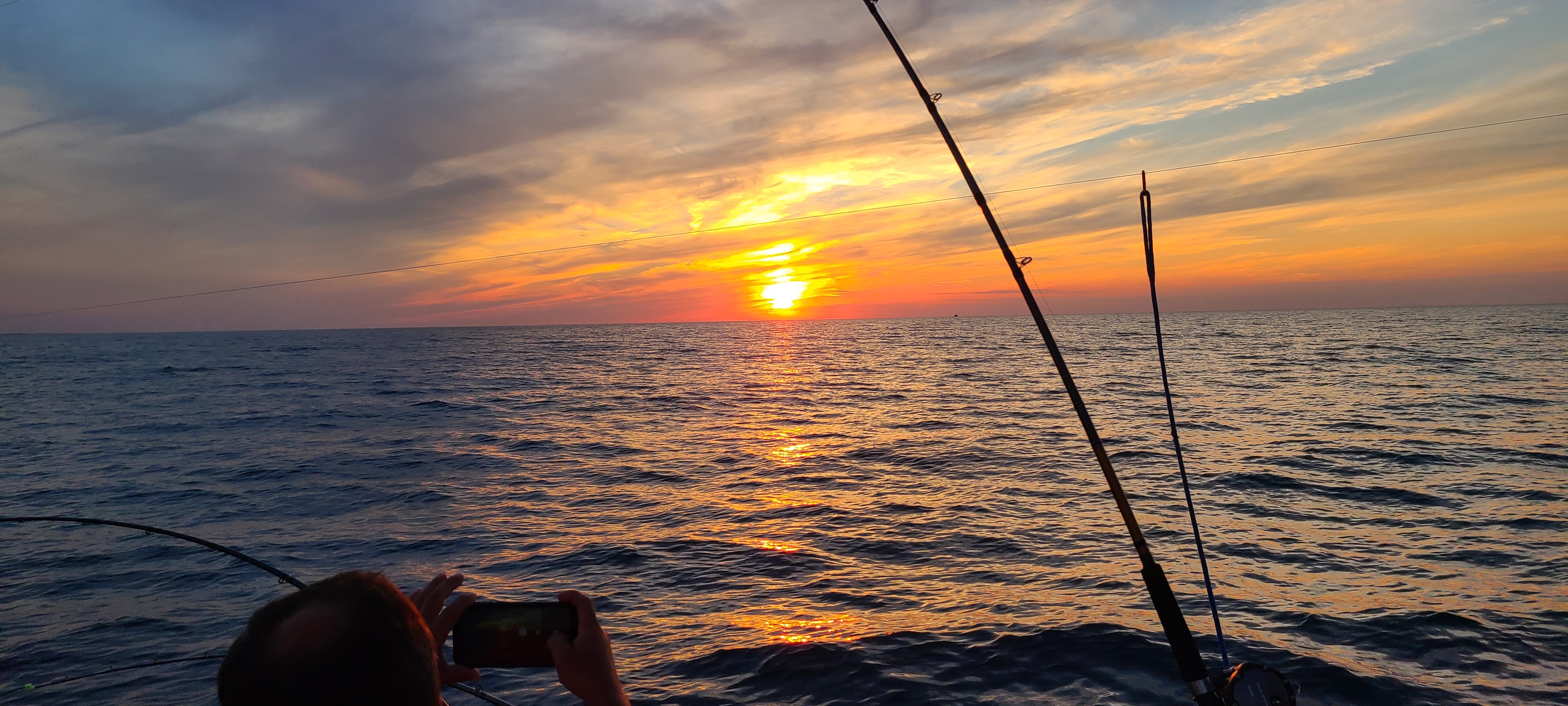 Lake Erie sunset fishing rods Pro-Tek charter