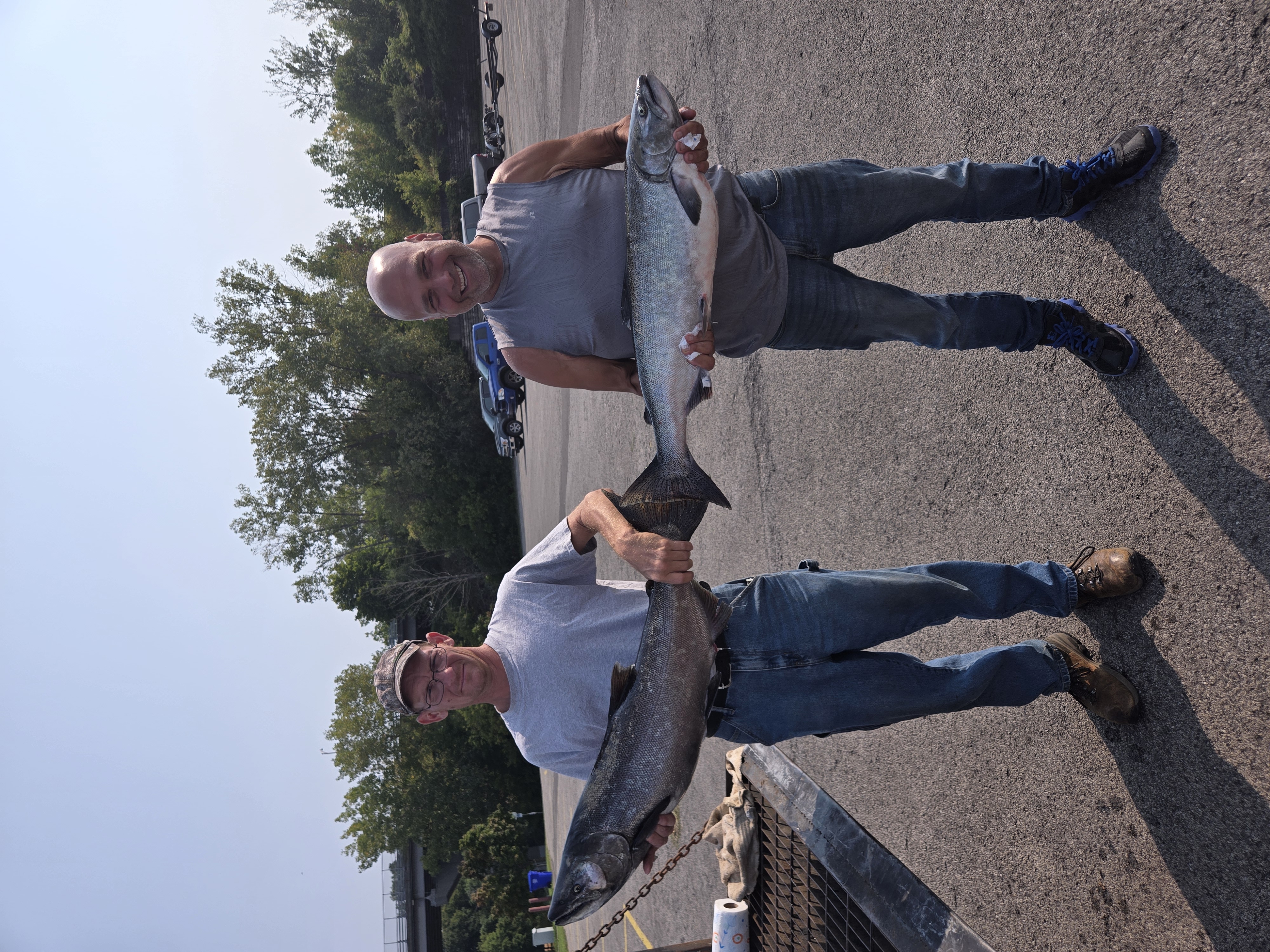 Two anglers trophy salmon Lake Ontario Pro-Tek