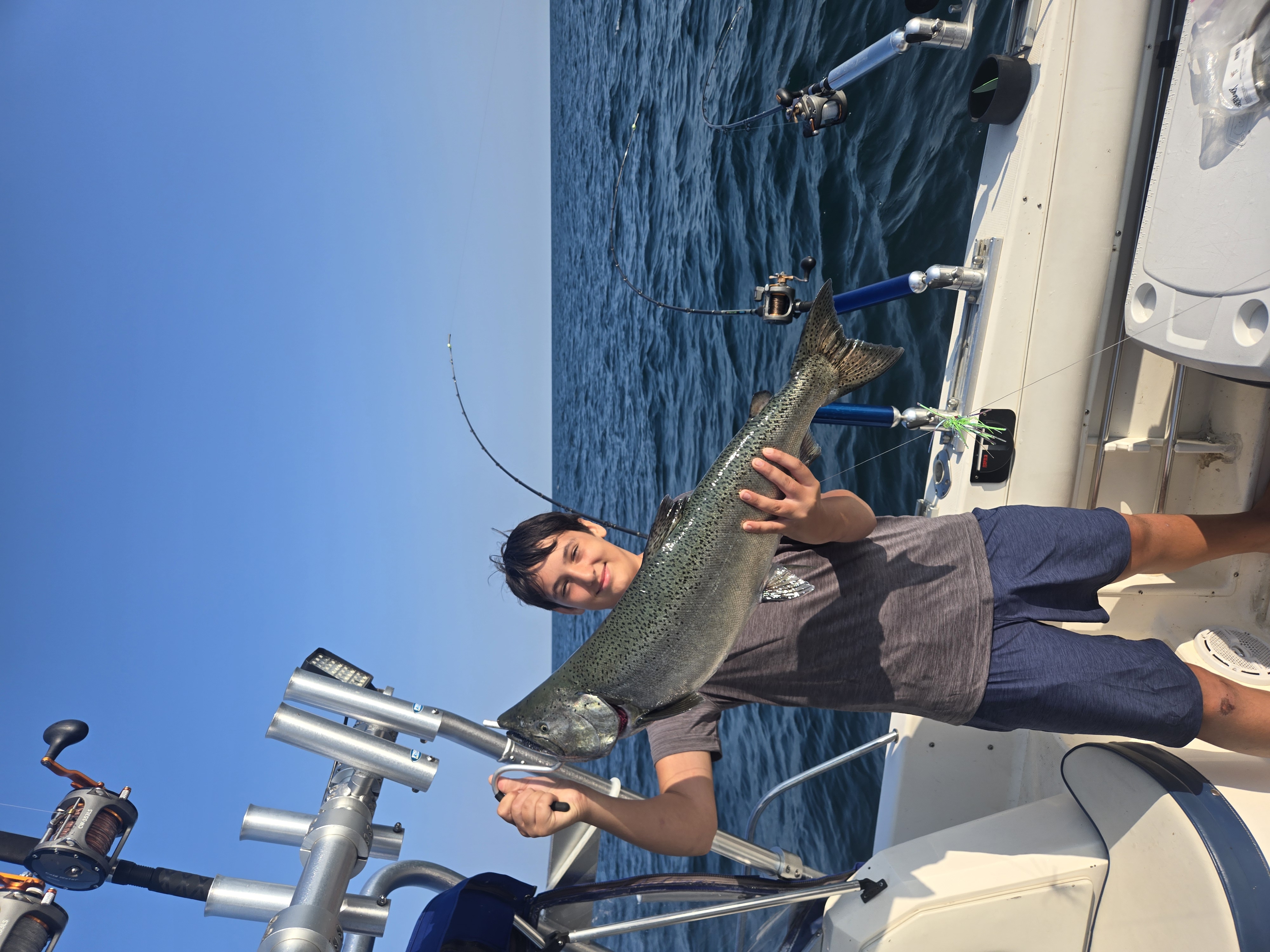 Kid big salmon Lake Ontario